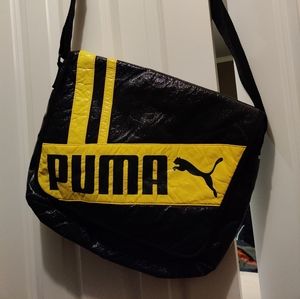 Gently used dark grey/blue Puma messenger bag
